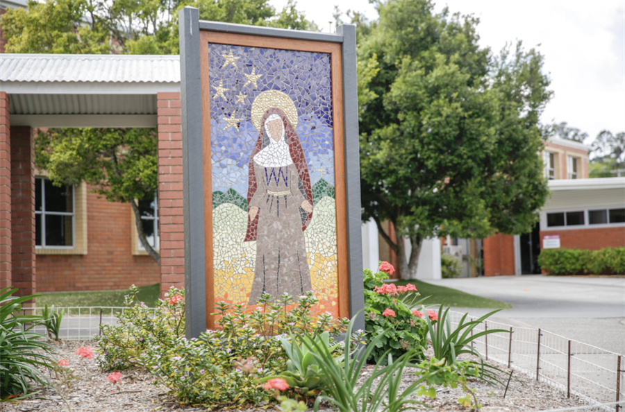 A photo of the mosaic of St Mary of the Cross MacKillop that is situated at the entrance to St Matthew's